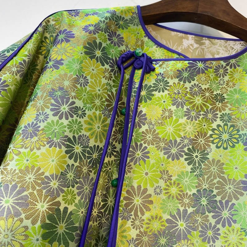 Modern men’s fashion with traditional Gambiered Guangdong Silk, blending heritage with contemporary design.
