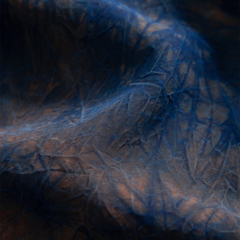 Close-up texture comparison: real Xiangyunsha silk vs. fake silk fabric.