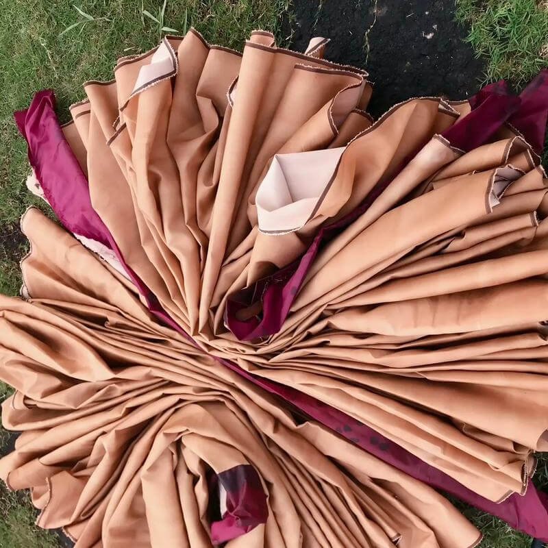Craftsman in Shunde creating Xiangyunsha Silk by hand with centuries-old techniques.