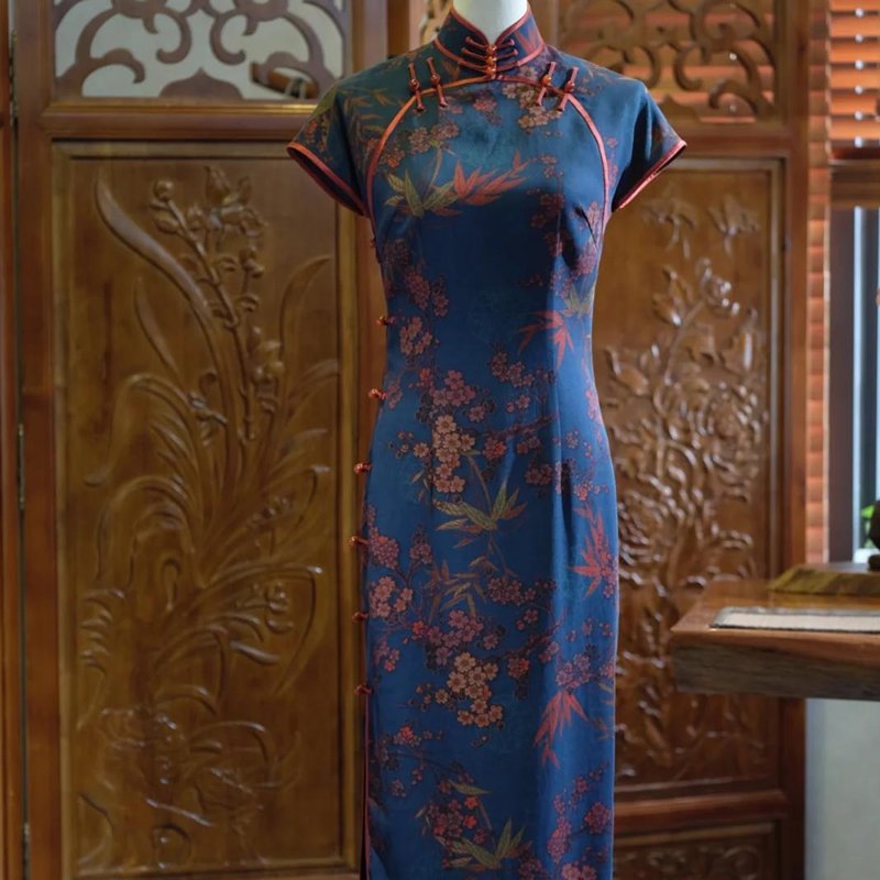A collection of Xiangyunsha Silk cheongsams, each piece showcasing a blend of tradition and modern elegance.