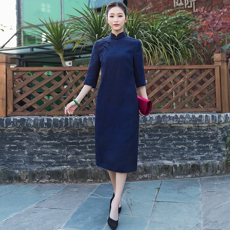 Detail of handcrafted Xiangyunsha Silk Cheongsam made with traditional techniques.