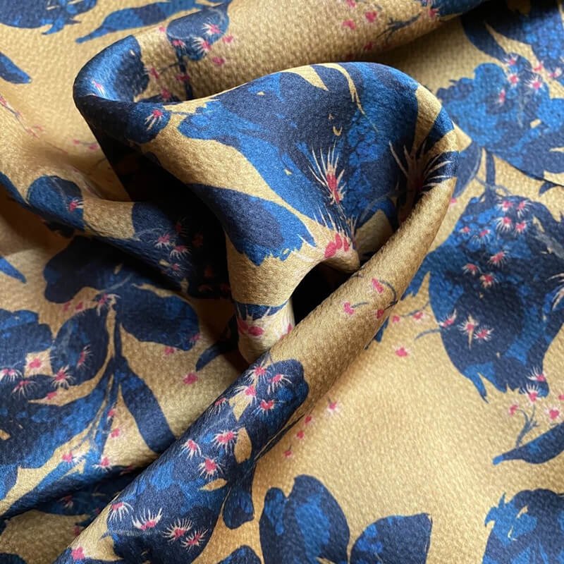 Stylish Xiangyunsha Silk shirt for men, made from Gambiered Silk Fabric, embodying eco-friendly luxury and timeless charm.